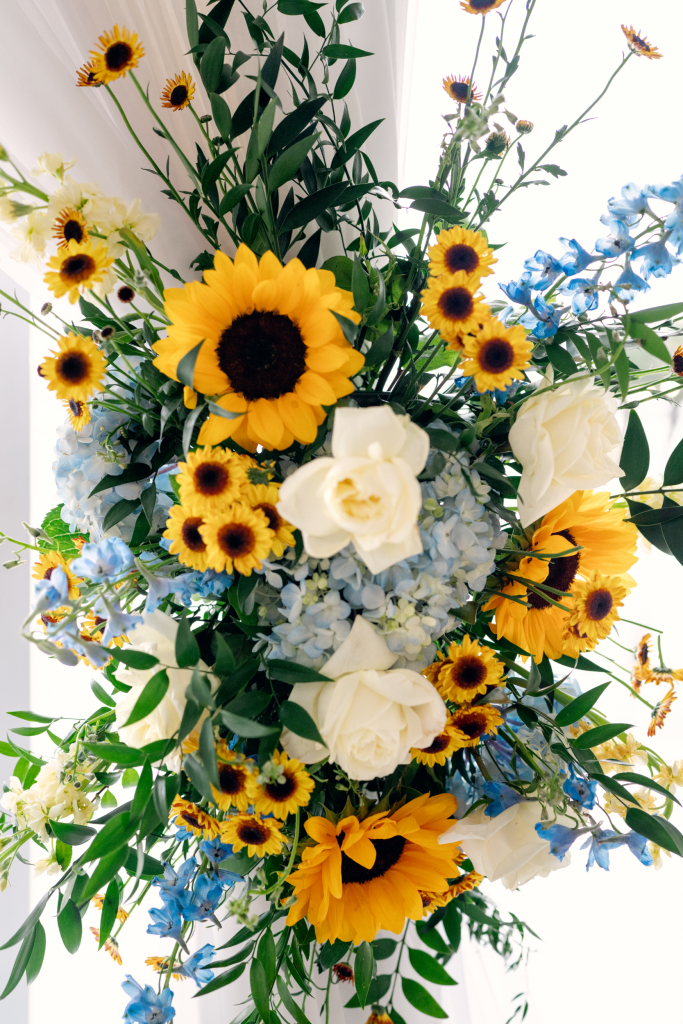 Dream Bouquet Florals Dream Bouquet altar florals at The Waters Edge