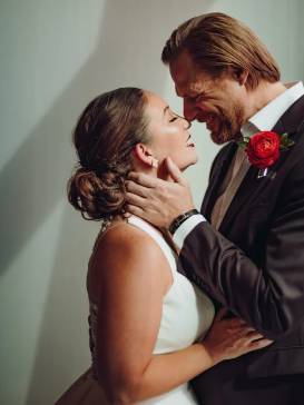 ChatGPT Image Jan 6, 2026, 02_28_52 PM Two grooms sharing their first dance surrounded by wedding florals at Houston reception