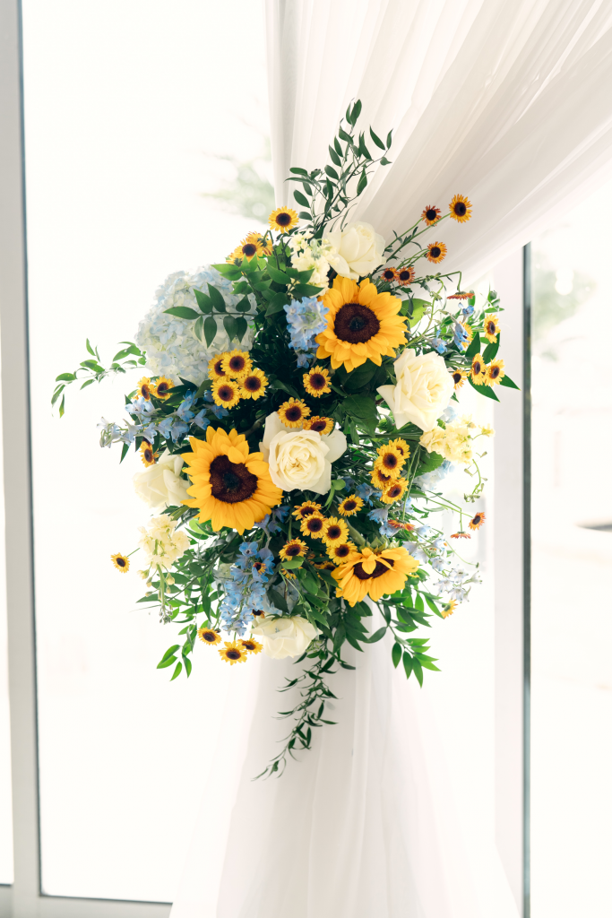 Dream Bouquet Florals at The Waters Edge Altar accents by Dream Bouquet by Waters Edge